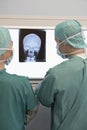 Radiologists Examining Xray Of Skull Royalty Free Stock Photo