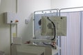 Radiology technician on x-ray machine monitor