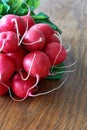 Radish bunch on wooden table Royalty Free Stock Photo
