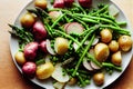 radish salad with asparagus potatoes and peas on plate