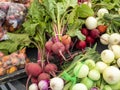 Radishes and assorted vegetables on display for sale at the local market Royalty Free Stock Photo