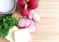 Radishes. Ingredients for radish spread or radish soup - radishes, butter, cream and green parsley. Royalty Free Stock Photo