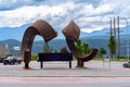 Radium Hot Springs, British Columbia, Canada - July 7, 2022: Bighorm ram sheep sculpture artwork in a roundabout traffic circle in