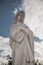 Holy Mary stone statue. Mother Mary sculpture