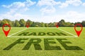 Radon free: land free from the natural dangerous radioactive gas that comes from the earth - concept with text over a green mowed