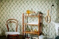 Radun castle interior, Neo-Classical chateau, bathroom, towels, mirror, personal hygiene products and soap, jars on a wooden shelf