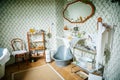 Radun castle interior, Neo-Classical chateau, bathroom, towels, mirror, personal hygiene products and soap, jars on a wooden shelf Royalty Free Stock Photo