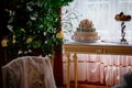 Radun castle interior, Neo-Classical chateau, red tea salon, baroque and rococo white furniture, table set for tea, sweets and