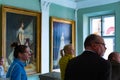 Radun, Czech Republic, 7 April 2019 - The interior with beautiful pictures on wall and tourists of Radun Castle, located