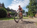 The triathlete leaves the depot for the cycling circuit