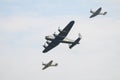 RAF BBMF, Battle of Britain Memorial Flight, flypast - Lancaster, Spitfire and Hurricane showing undersides Royalty Free Stock Photo