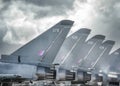 RAF Coningsby Modern Typhoon Eurofighter military combat jet fighters aircraft stationary five in a row with engines running heat Royalty Free Stock Photo