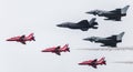 RAF F-35B with two Eurofighter Typhoons and the Red Arrows Royalty Free Stock Photo