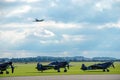 RAF fighter aircraft from the Battle of Britain era parked at an airfield Royalty Free Stock Photo