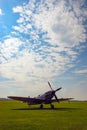 RAF fighter aircraft from the Battle of Britain era parked at an airfield Royalty Free Stock Photo