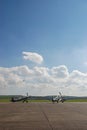 RAF fighter aircraft from the Battle of Britain era parked at an airfield Royalty Free Stock Photo