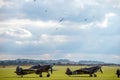 RAF fighter aircraft from the Battle of Britain era parked at an airfield Royalty Free Stock Photo