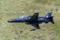 RAF Hawk T2 flying through the Mach Loop Royalty Free Stock Photo