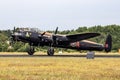 RAF Historical flight Avro Lancaster WW2 landing at Gilze-Rijen Airbase. The Netherlands - June 21, 2014