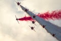 RAF Red Arrows aerobatic demonstration team performing at the Sanicole Airshow during sunset. Belgium. September 10, 2021 Royalty Free Stock Photo