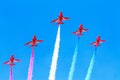 RAF Red Arrows aerobatic team with white smoke