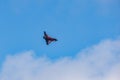 The RAF Typhoon, callsign Blackjack flies against a bright blue sky Royalty Free Stock Photo