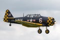 North American AT-6C SNJ Texan/Harvard G-TSIX in US Navy markings on approach to land. Royalty Free Stock Photo