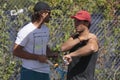 Rafa nadal gesturing next to coach carlos moya