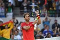 Rafael Nadal playing tenni