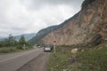 Raffic of cars. Road, the natural landscape and Mountains