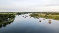 Aerial photography at raft restaurants floating around the Reservoir Huang ta Guan Bang Mul Nak province Phichit Thailand Unseen