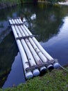 Raft for salvaging fallen leaves in pond, Boats. Rafts. Royalty Free Stock Photo