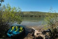 Raft tied up at the Donner Lake shoreline Royalty Free Stock Photo