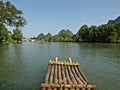 A raft on Yu Long river with Karst mountain