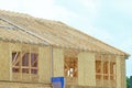 rafters and walls of new plywood house wooden framework Royalty Free Stock Photo