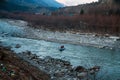 Rafting : boat moving on quiet river section -river Beas