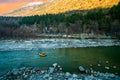 Rafting : boat moving on quiet river section-river Beas . next to Kullu town in Himachal Pradesh