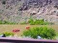 Rafting river people rocks trees