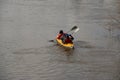 Rafting on the river. tourists swim in the forest river in the flood on a canoe. kayaking on high water in the spring forest. Royalty Free Stock Photo