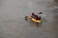 Rafting on the river. tourists swim in the forest river in the flood on a canoe. kayaking on high water in the spring forest. Royalty Free Stock Photo