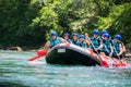 Rafting team goes down the river on the beautiful sunny day