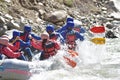 Rafting team splashing