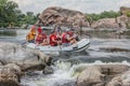 Rafting team , summer extreme water sport. Group of people in a rafting boat, beautiful