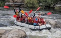 Rafting team , summer extreme water sport. Group of people in a rafting boat, beautiful