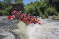 Rafting team , summer extreme water sport. Group of people in a rafting boat, beautiful