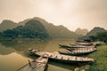 Rafts await villagers by the lake in Vietnam Royalty Free Stock Photo