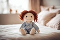 Rag doll on a bed in a child\'s room. Royalty Free Stock Photo