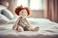 Rag doll on a bed in a child\'s room. Royalty Free Stock Photo
