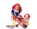 Rag Doll Reading to Her Baby Royalty Free Stock Photo