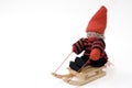 Rag doll on toy sled Royalty Free Stock Photo